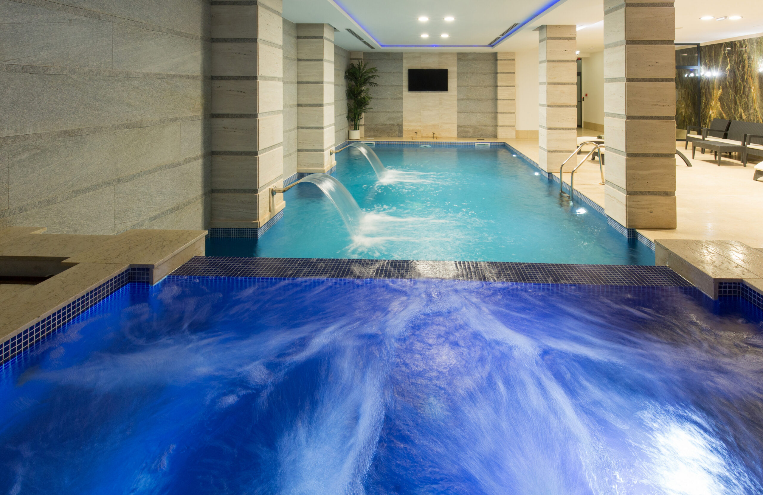 Swimming pool in hotel spa and wellness center